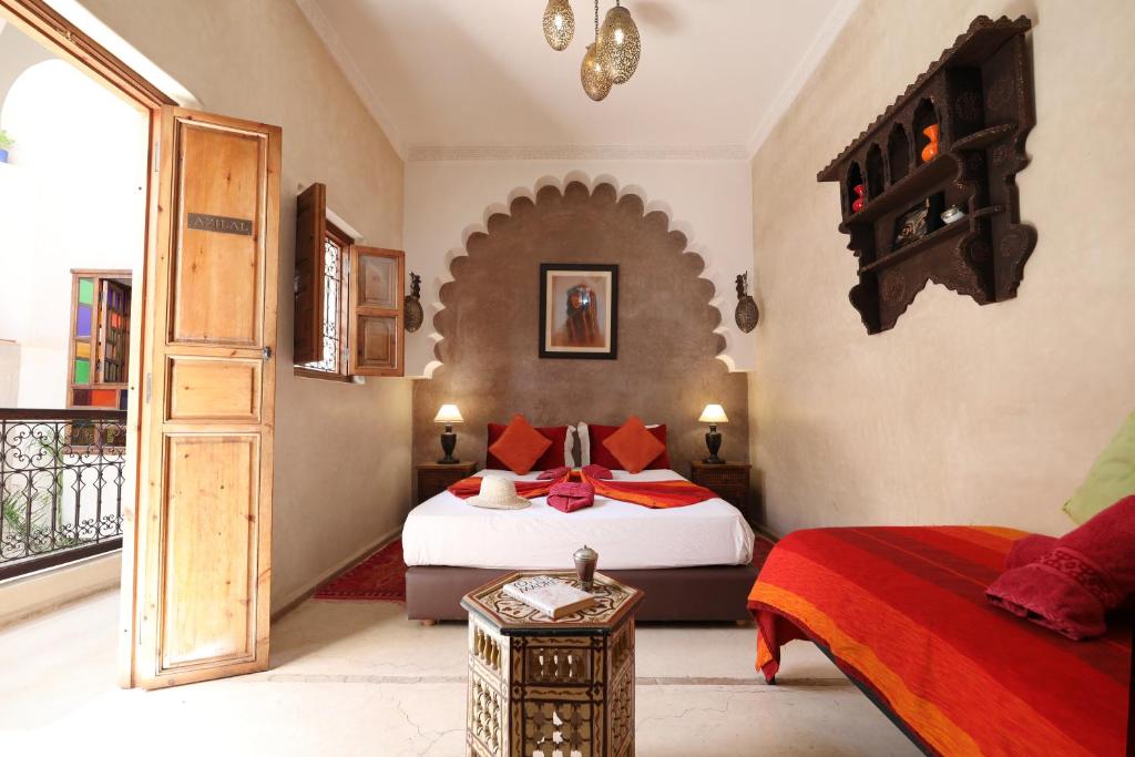 Postel nebo postele na pokoji v ubytování Riad Sidi Mimoune & Spa