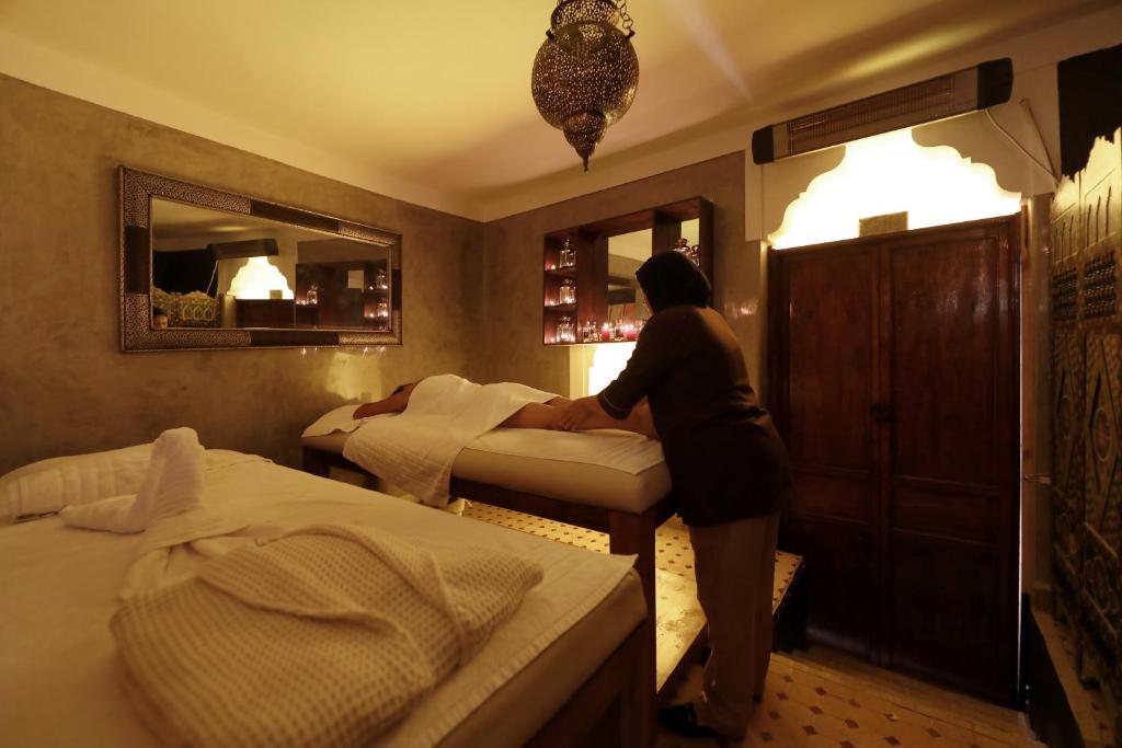 Postel nebo postele na pokoji v ubytování Riad Sidi Mimoune & Spa