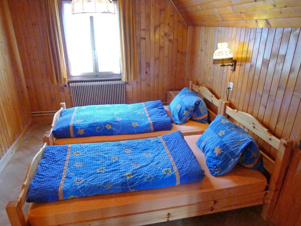 Postel nebo postele na pokoji v ubytování Apartment Heiderösli-3 by Interhome