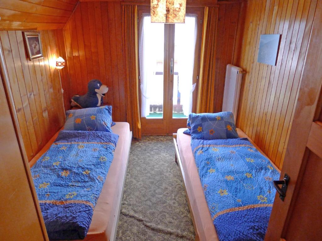 Postel nebo postele na pokoji v ubytování Apartment Heiderösli-3 by Interhome