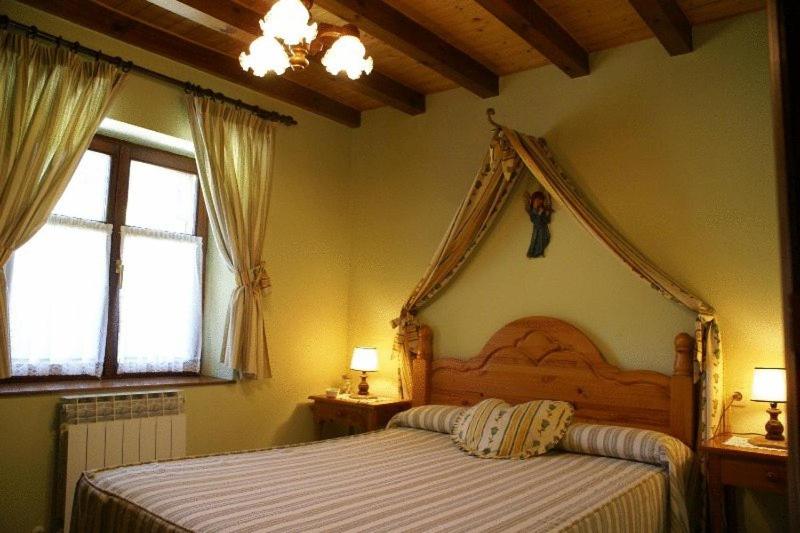 Postel nebo postele na pokoji v ubytování Agroturismo Urresti