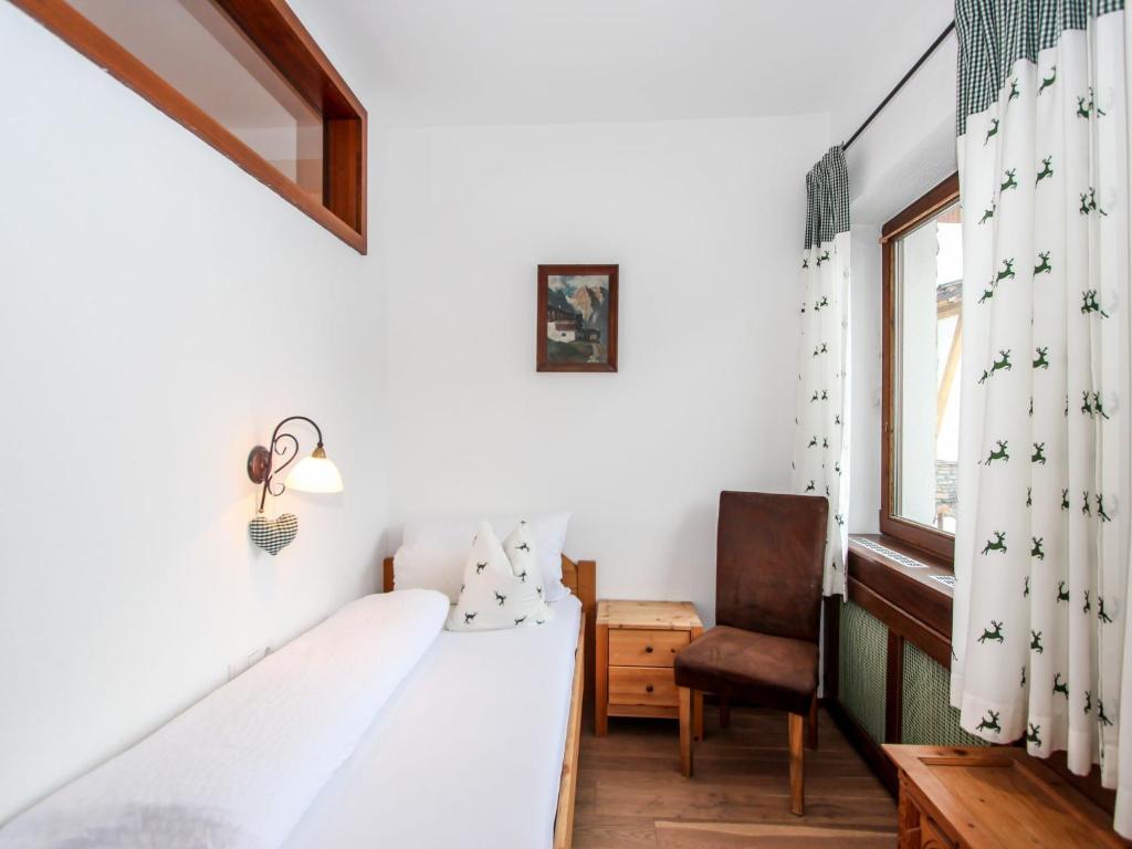 Postel nebo postele na pokoji v ubytování Apartment Tyrol-2 by Interhome
