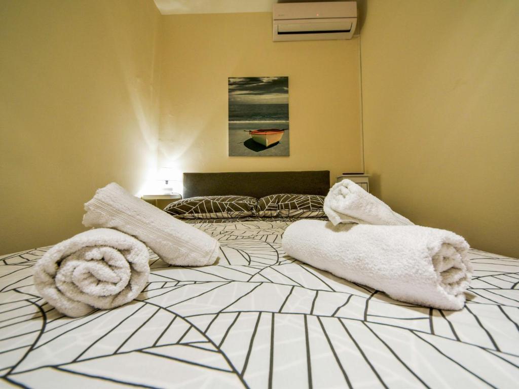 Łóżko lub łóżka w pokoju w obiekcie Holiday Home Mali dvori by Interhome