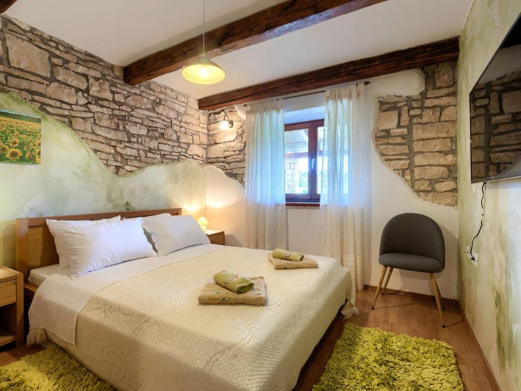 Posteľ alebo postele v izbe v ubytovaní Holiday Home Villa Prisedi by Interhome