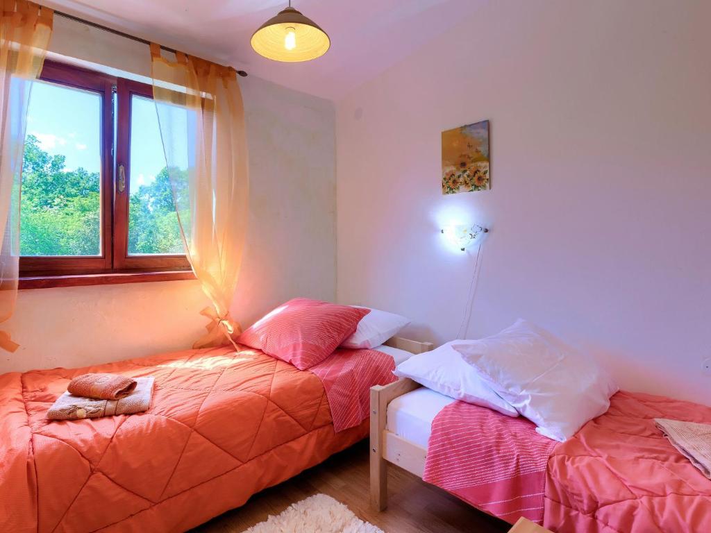 Posteľ alebo postele v izbe v ubytovaní Holiday Home Villa Prisedi by Interhome