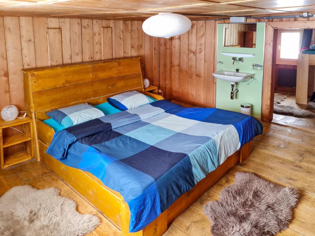 Postel nebo postele na pokoji v ubytování Apartment Feu de Joie by Interhome