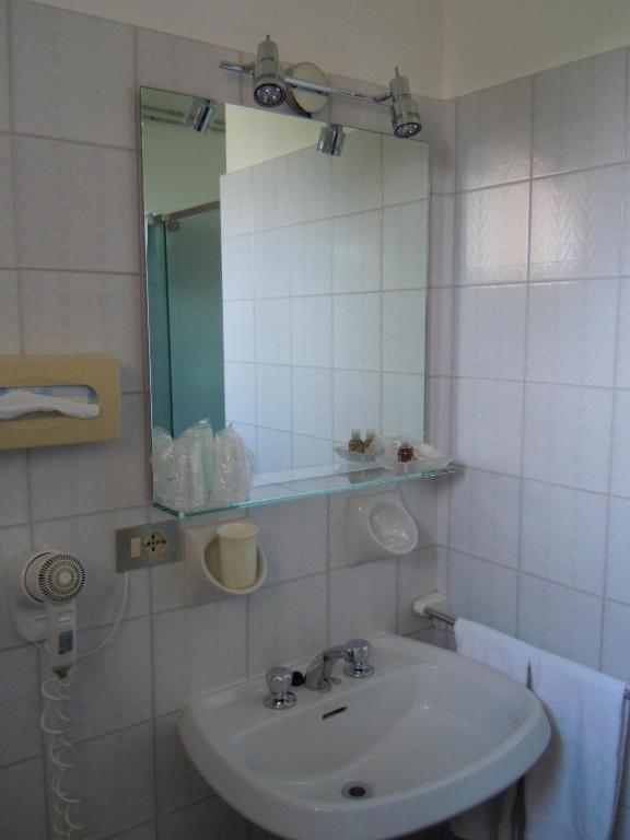 Koupelna v ubytování Albergo Bagner