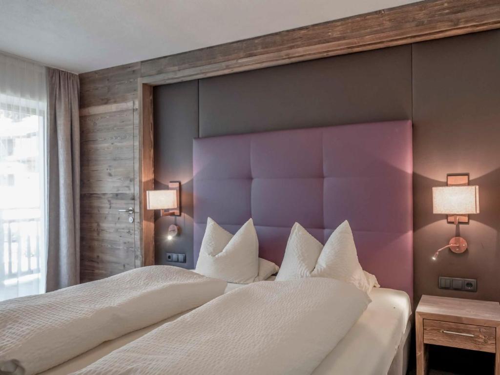Posteľ alebo postele v izbe v ubytovaní Apartment Melisande 2 by Interhome