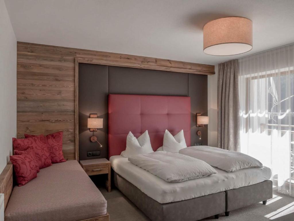 Posteľ alebo postele v izbe v ubytovaní Apartment Melisande 2 by Interhome