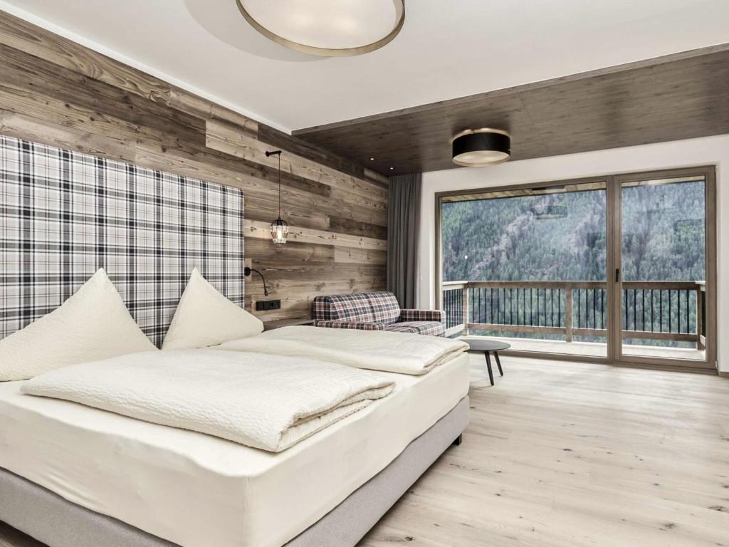 Posteľ alebo postele v izbe v ubytovaní Apartment Appartement Wallis by Interhome