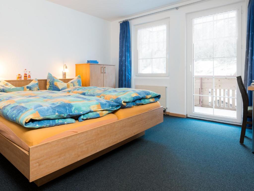 Postel nebo postele na pokoji v ubytování Chalet Piccolo by Interhome