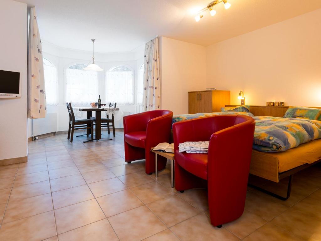 Postel nebo postele na pokoji v ubytování Chalet Piccolo by Interhome