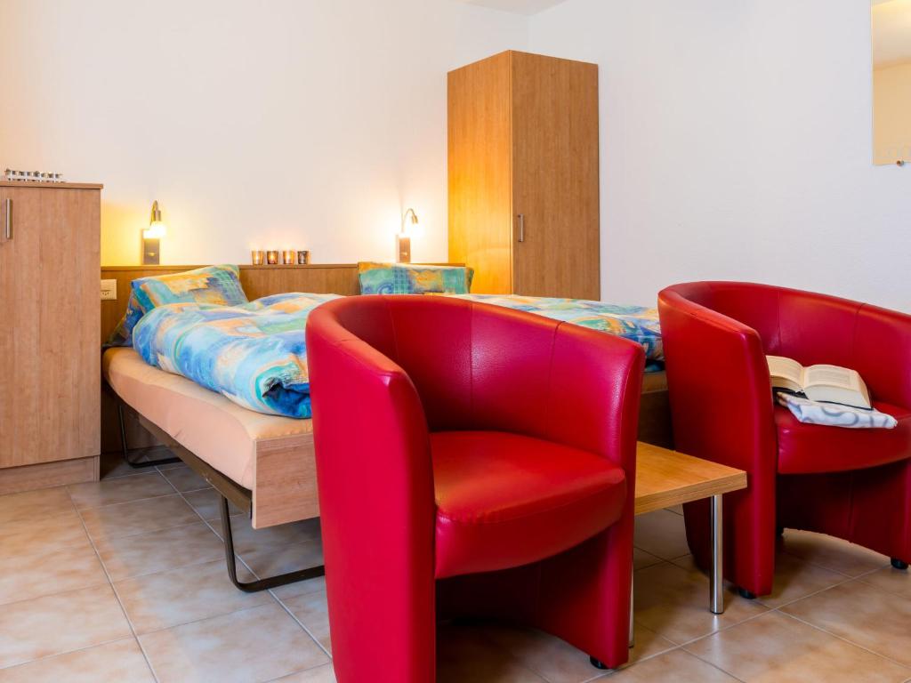 Postel nebo postele na pokoji v ubytování Chalet Piccolo by Interhome