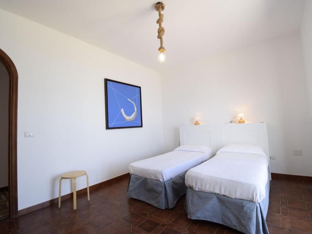Łóżko lub łóżka w pokoju w obiekcie Holiday Home Santa Maria by Interhome