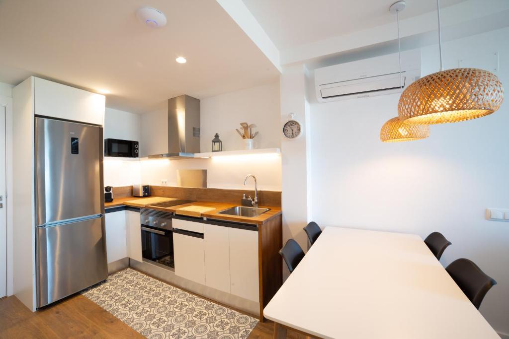 Kuchyň nebo kuchyňský kout v ubytování Apartaments Voralmar