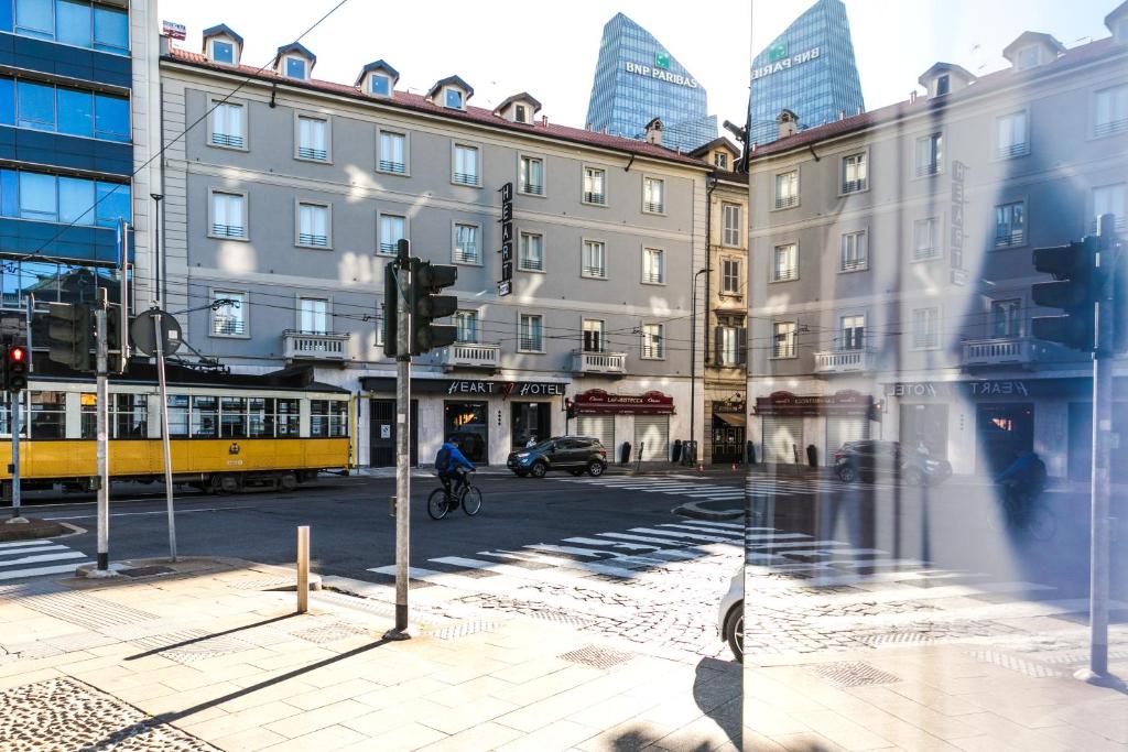 a view of a city street with a building at Heart Hotel Milano in Milan