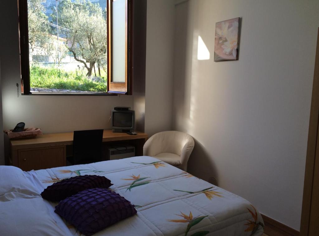 Postel nebo postele na pokoji v ubytování Bellaria Relais