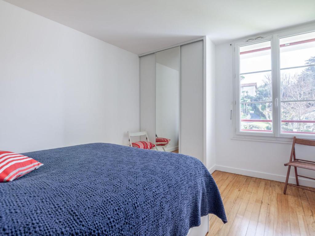 Ein Bett oder Betten in einem Zimmer der Unterkunft Apartment La Cit&eacute; du Lac-4 by Interhome
