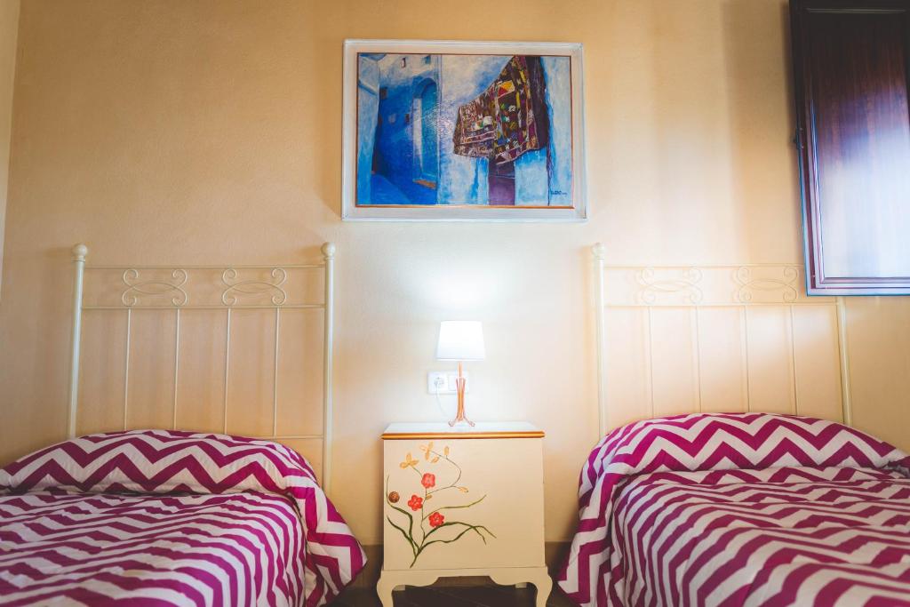 Postel nebo postele na pokoji v ubytování Alojamiento rural Las Alberquillas