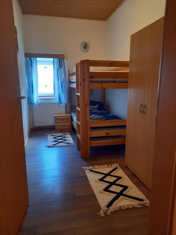 Postel nebo postele na pokoji v ubytování Gasthof Muster-Stüberl