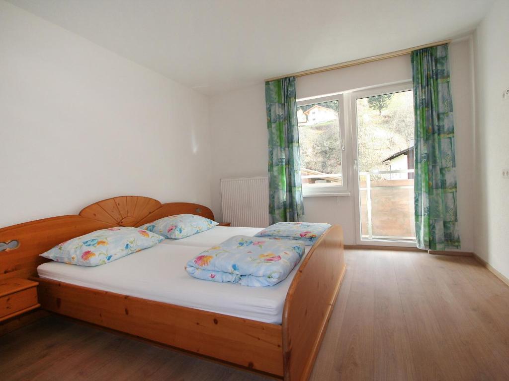 Postel nebo postele na pokoji v ubytování Apartment Alpenrose-1 by Interhome