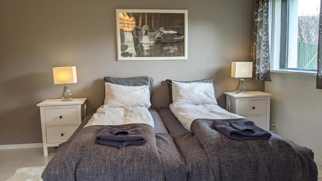 Postel nebo postele na pokoji v ubytování Sudavik guesthouse