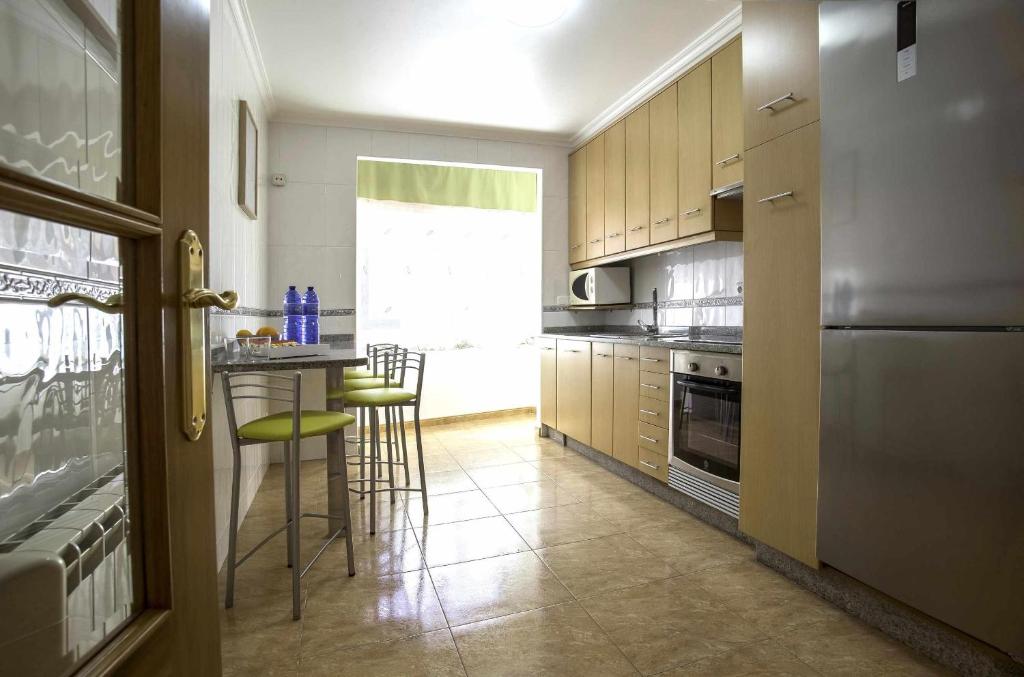 Kuchyňa alebo kuchynka v ubytovaní Apartamento en Raxó