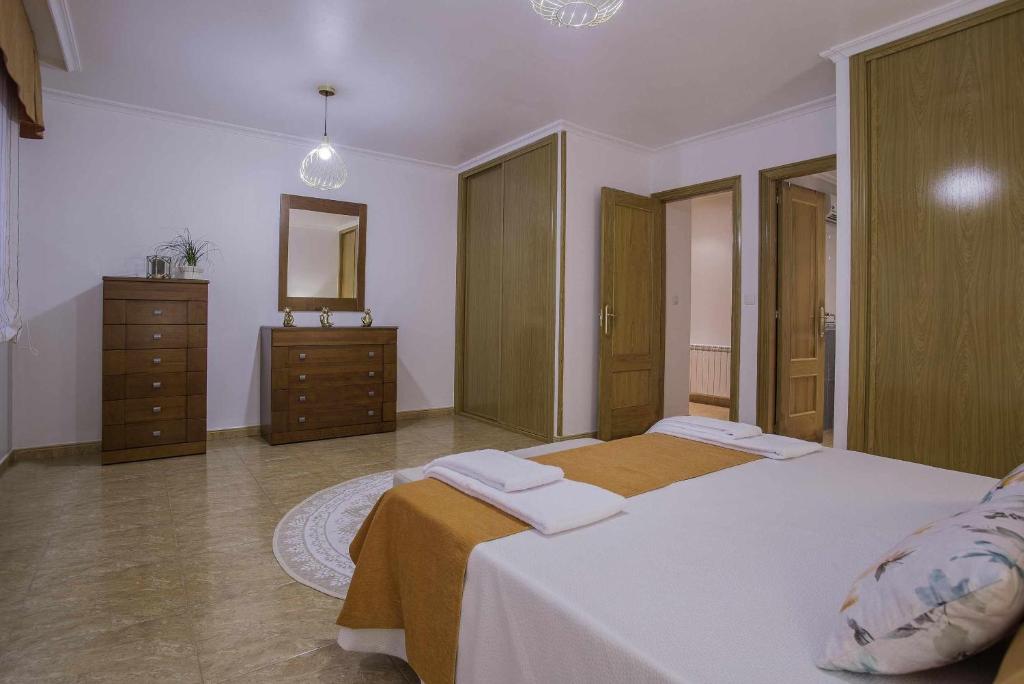 Posteľ alebo postele v izbe v ubytovaní Apartamento en Raxó