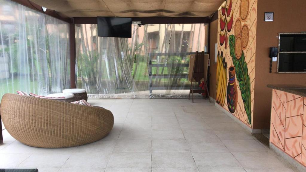 TV a/nebo společenská místnost v ubytování Angra dos Reis - Porto Bali - SUÍTE no Porto Bali Resort