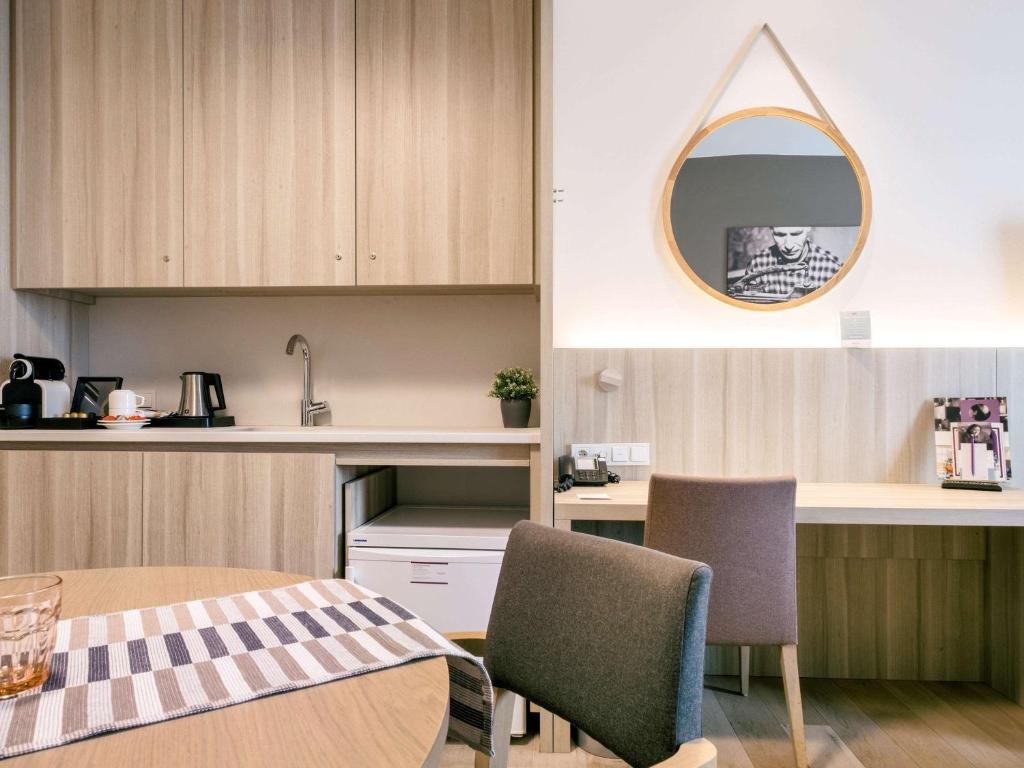 Kuchyň nebo kuchyňský kout v ubytování Mercure Roeselare
