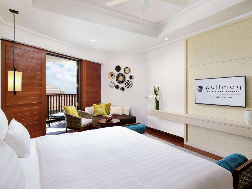 Postel nebo postele na pokoji v ubytování Pullman Danang Beach Resort