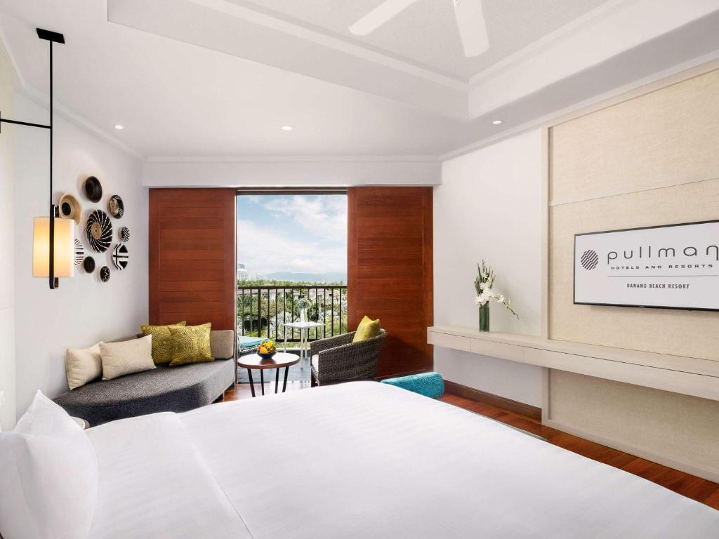 Postel nebo postele na pokoji v ubytování Pullman Danang Beach Resort