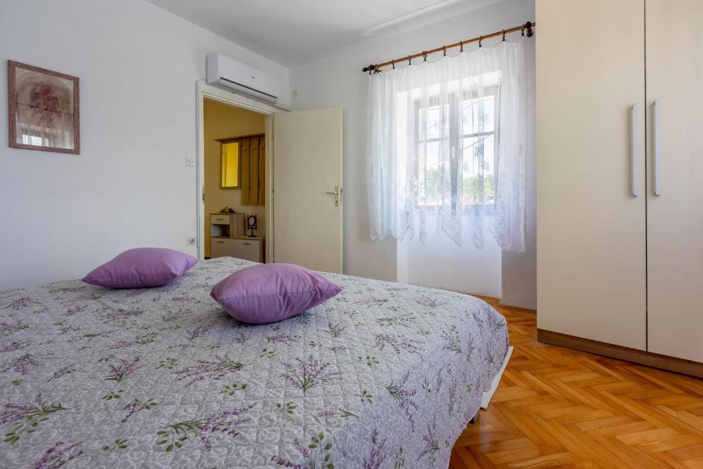Postel nebo postele na pokoji v ubytování House Katica