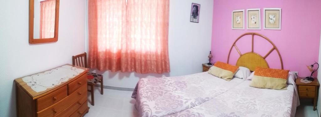 Posteľ alebo postele v izbe v ubytovaní Apartamentos Esmeralda 2