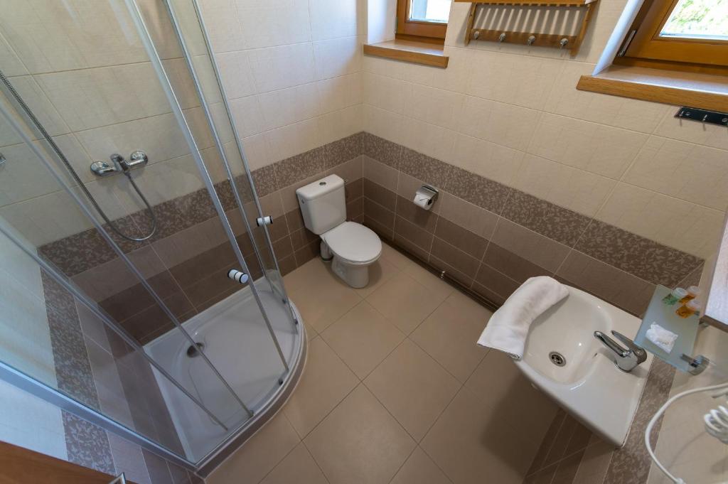 Koupelna v ubytování Penzion Na Špičáku