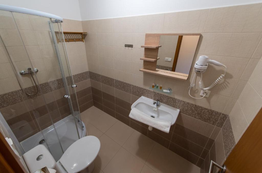 Koupelna v ubytování Penzion Na Špičáku