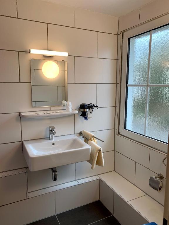 Koupelna v ubytování Hotel Reutiner Hof