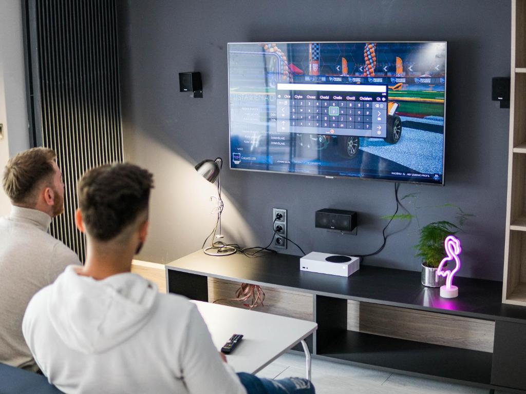 Televízia a/alebo spoločenská miestnosť v ubytovaní Cobalt Apartments