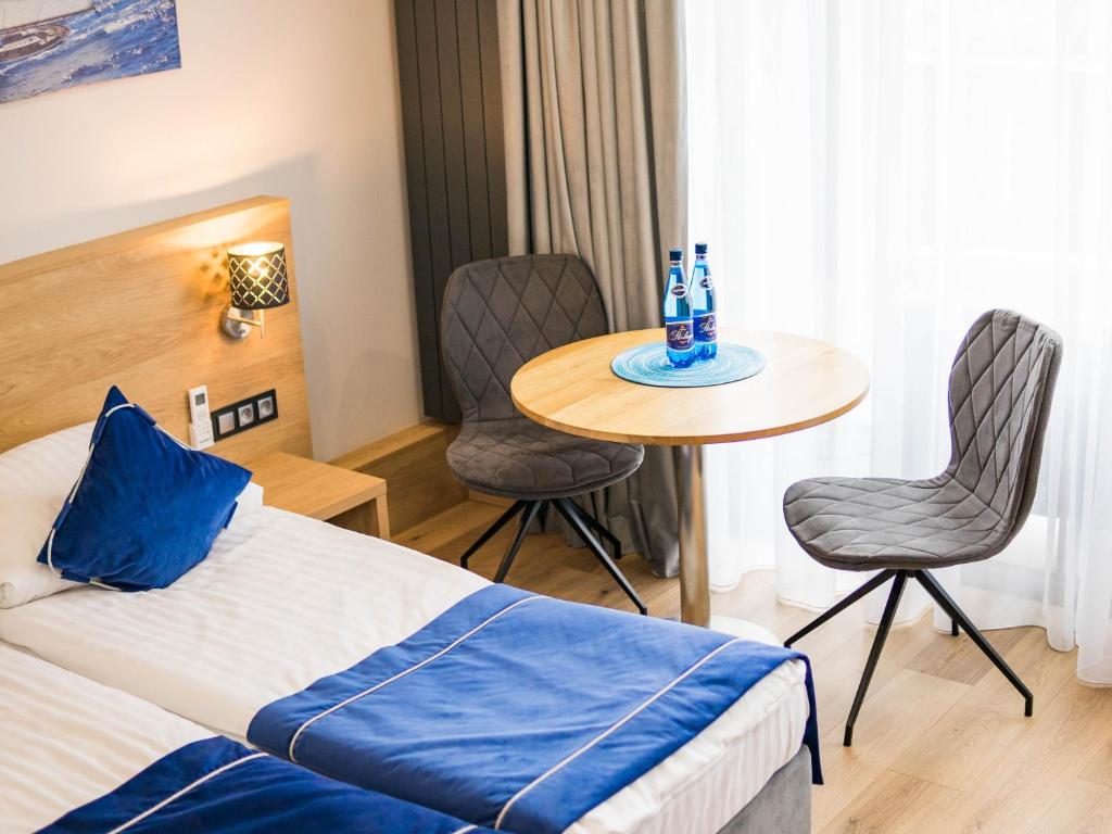Posteľ alebo postele v izbe v ubytovaní Cobalt Apartments