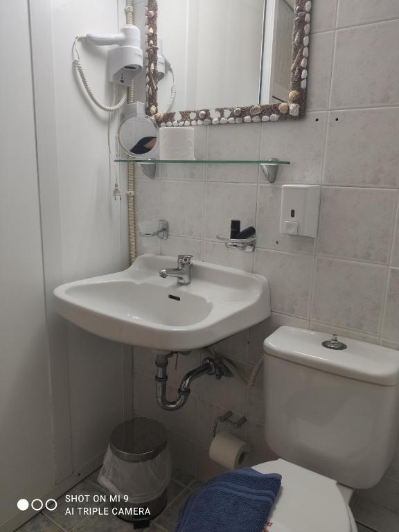 Kúpeľňa v ubytovaní Hotel Trifylia