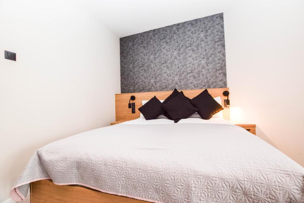 Posteľ alebo postele v izbe v ubytovaní Apartamenty nad Wisłą