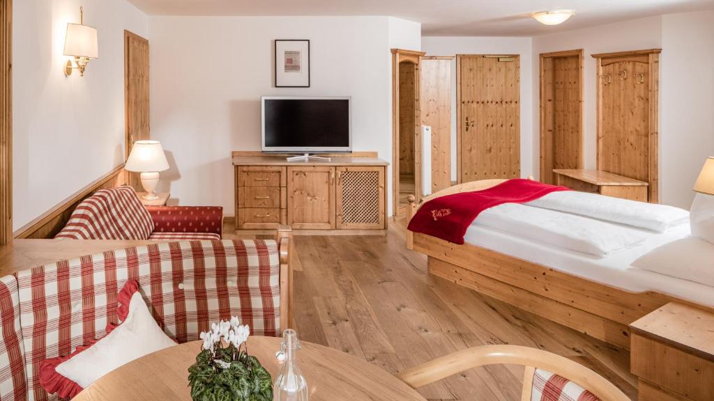 Postel nebo postele na pokoji v ubytování Hotel Saltauserhof