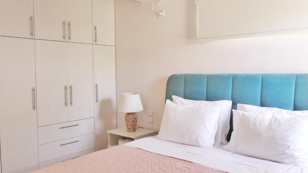 Posteľ alebo postele v izbe v ubytovaní Villa Victoria Boutique Apartments