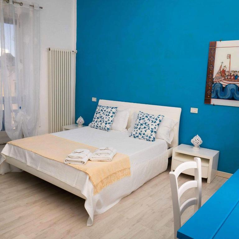 Postel nebo postele na pokoji v ubytování Casa Junno