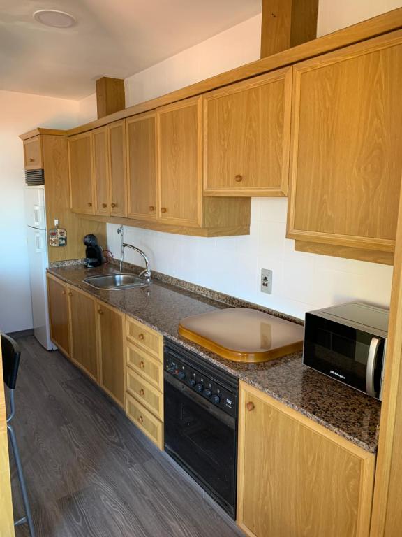 Kuchyň nebo kuchyňský kout v ubytování Ático Duplex Silgar