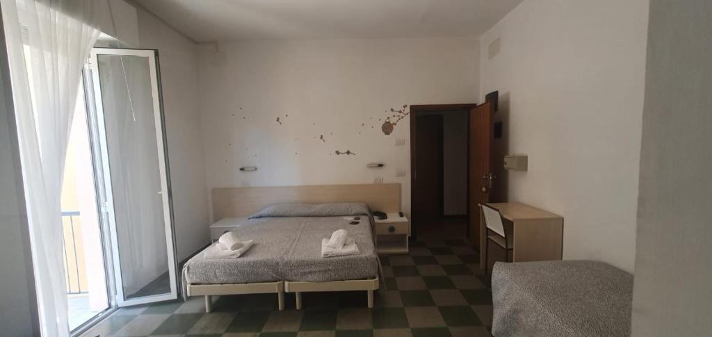 Postel nebo postele na pokoji v ubytování HOTEL VENUS
