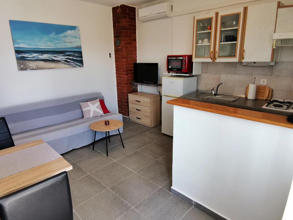 Kuchyň nebo kuchyňský kout v ubytování Apartment Hramina