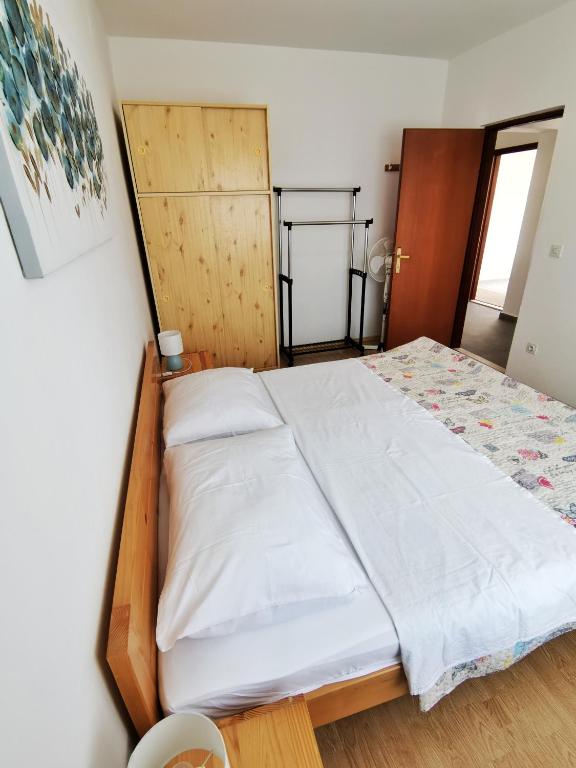 Postel nebo postele na pokoji v ubytování Apartment Hramina
