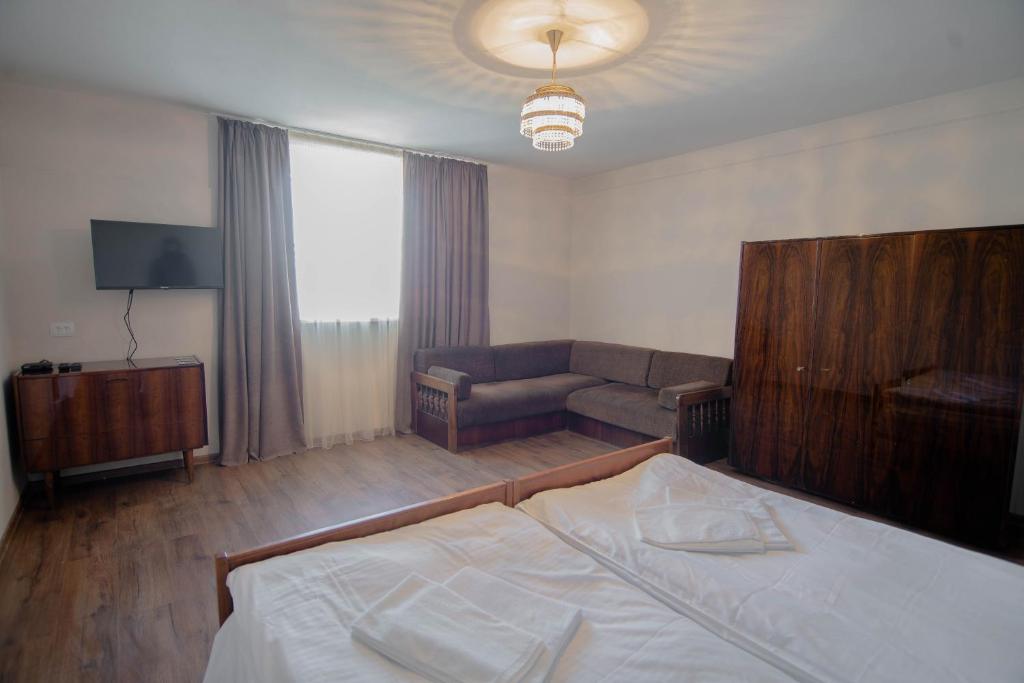 Postel nebo postele na pokoji v ubytování Guest House "Old House"