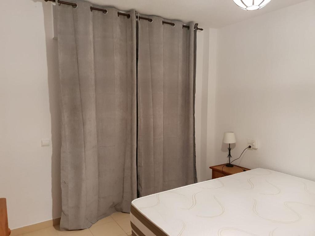 Postel nebo postele na pokoji v ubytování Almerimar Apartamento